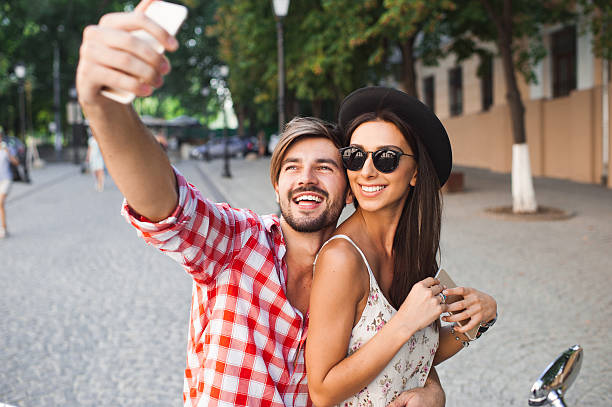 istock couple making selfie photo 511519118