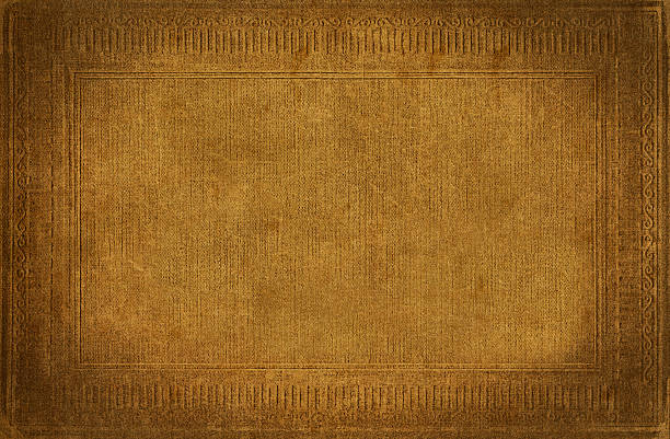 Golden background from vintage fabric texture with antique ornamental frame Golden vintage background from distress fabric texture with antique ornamental frame, suitable for special occasion, framework for your content. shag rug stock pictures, royalty-free photos & images
