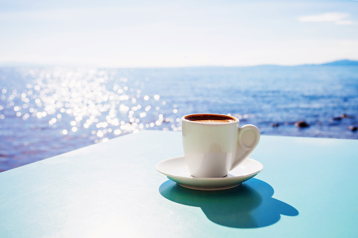 Greek coffee with the sea at the background