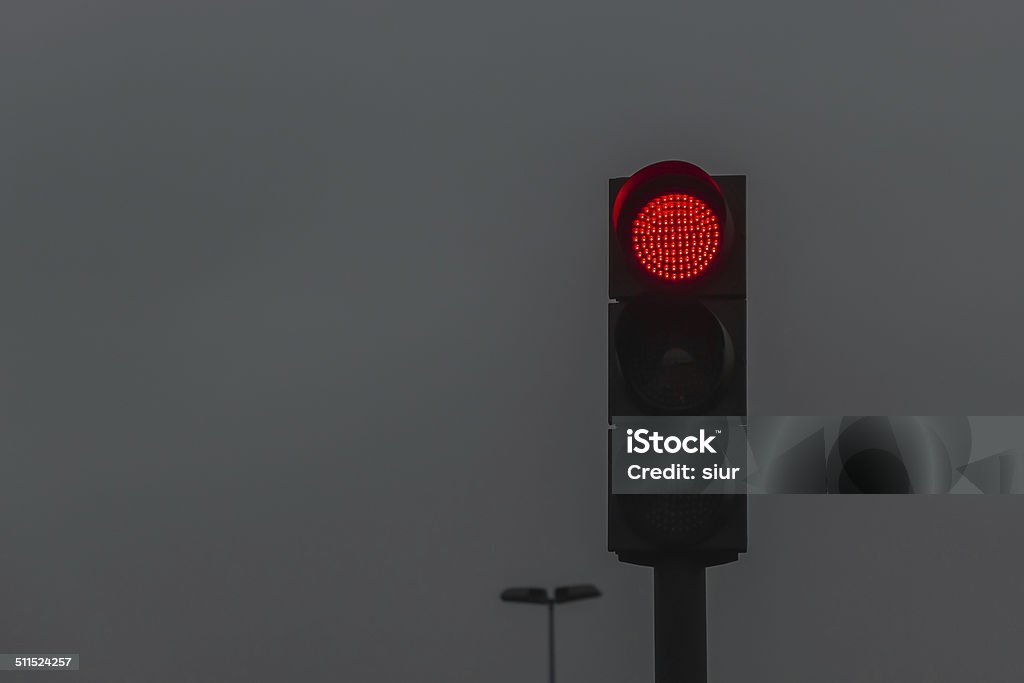 Red Light Traffic Light Gray Sky -  Semaforo en Rojo Red traffic light on dark sky Night Stock Photo