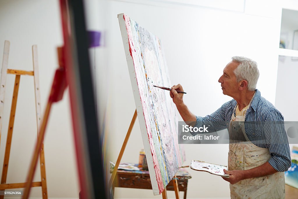 Makers gonna make Shot of a senior man working on a painting at homehttp://195.154.178.81/DATA/i_collage/pu/shoots/806388.jpg Painting - Activity Stock Photo