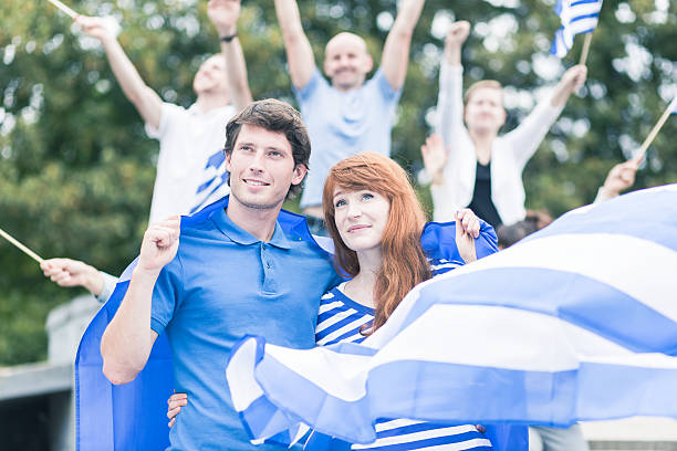 istock Protesters with flag of greece 511528462