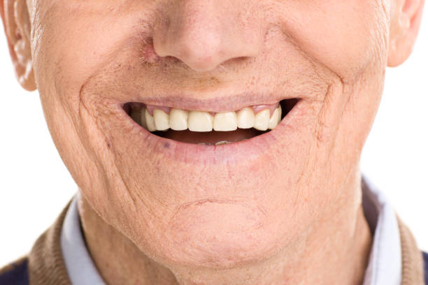istock Close-up on cheerful senior man smiling 511530514