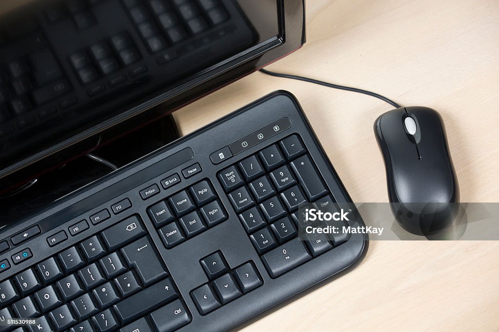Looking down on Keyboard and Mouse Computer Keyboard Stock Photo