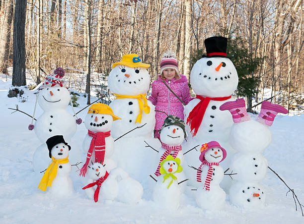 istock Girl with snowmen 511531720