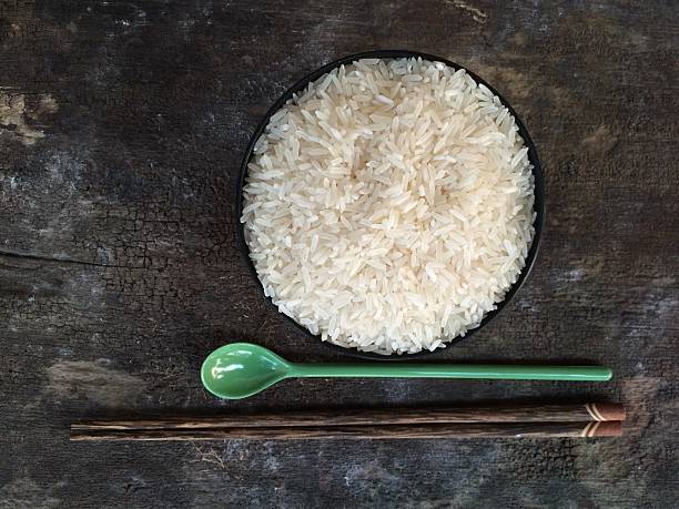 istock Rice on wooden floor 511533696