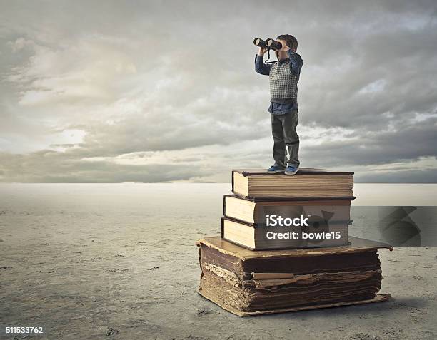 Books Of Knowledge Stock Photo - Download Image Now - Child, Binoculars, Boys