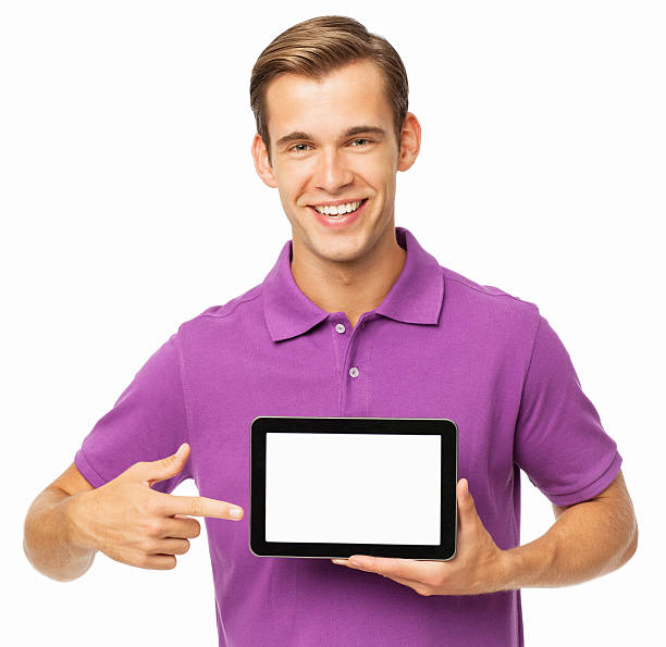 istock Smiling Man Pointing At Screen Of Digital Tablet 511534170