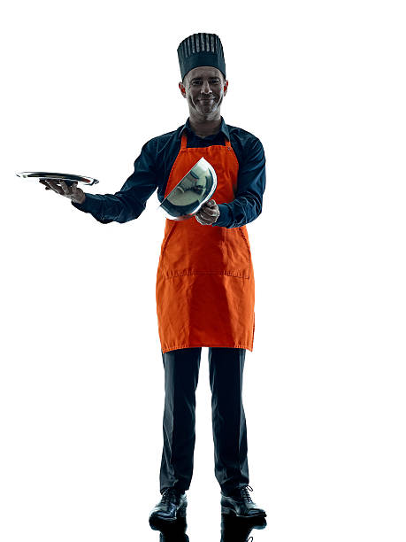 istock man cooking chef silhouette isolated 511536572