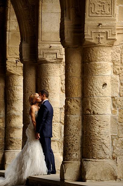 istock Beautiful wedding couple in the ancient building background. 511536620