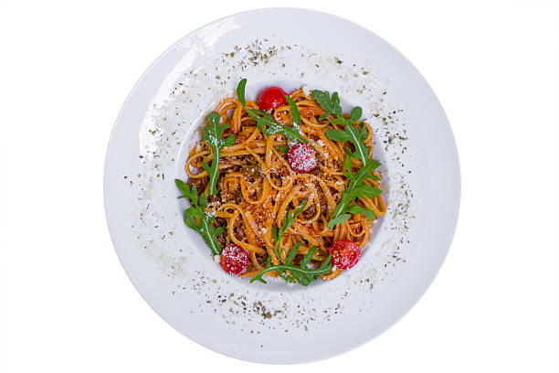 istock Spaghetti Bolognese with cherry tomatoes, top view 511536652