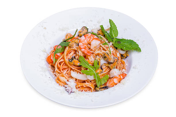 istock Pasta with seafood and parmesan cheese, isolated 511537534