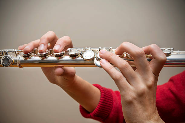 istock Woman Holding Flute 511539324