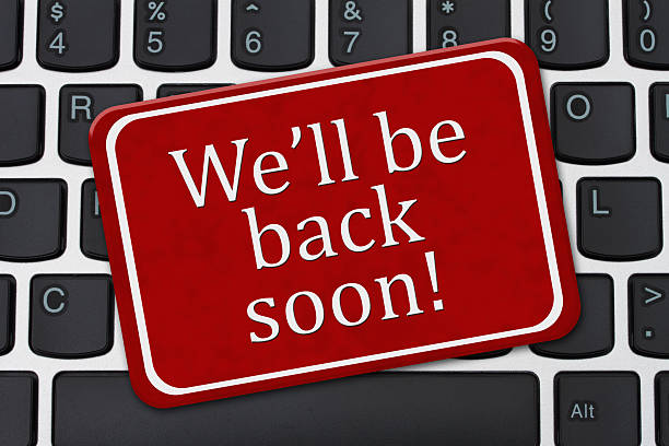 We'll Be Back Soon Sign We'll Be Back Soon Sign,  A red and white sign with the words We'll Be Back Soon on a computer keyboard moving down stock pictures, royalty-free photos & images