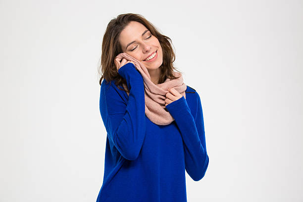 istock Sensual beautiful young woman basking by soft warm scarf 511541592