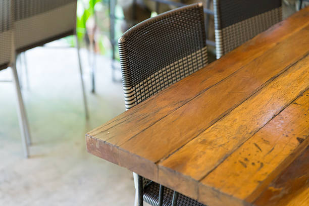 istock brown rattan chair and wooden table 511542022