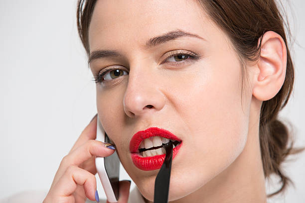 istock Seductive attactive young business woman talking on mobile phone 511542728