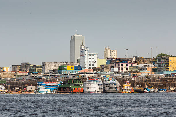 istock Typical wooden boats sailing on Rio Negro. 511543906