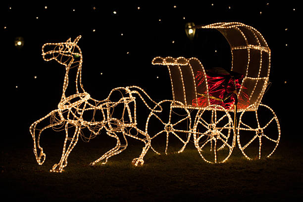 istock Shining Christmas horse-drawn carriage 511550001