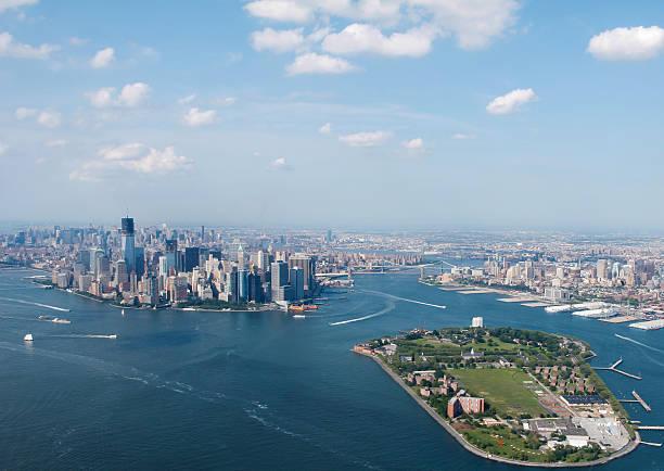 New York City Sky View With Governors Island Infront stock photo