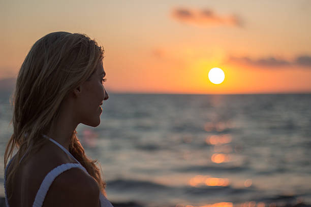 istock Woman face relaxing at sunset 511555315