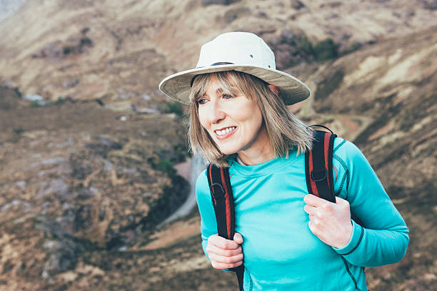 istock Woman hiking in Glencoe, Scotland 511572293