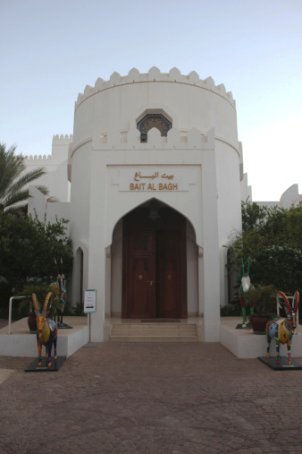 Muscat, Oman - October 19, 2013: Bait Al Zubair (House of Al Zubair) is a private museum that opened its carved wooden doors to the public in 1998. View of the entrance