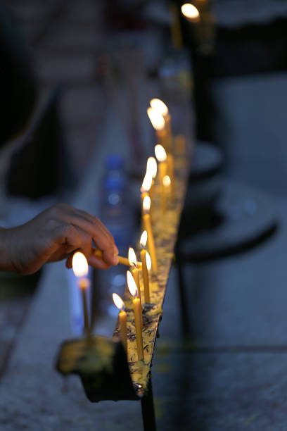 istock Hand that are Kindle Fire the candle. 511577473