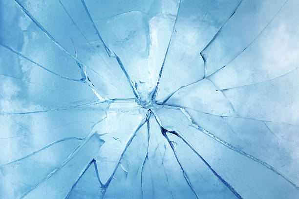 Cracked ice Close-up of cracked ice. fracture stock pictures, royalty-free photos & images