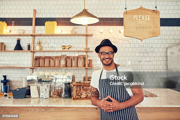 Male Barista Standing At Coffee Shop Stock Photo - Download Image Now - Cafe, Hipster Culture, Owner