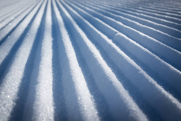 Groomed ski piste stock photo