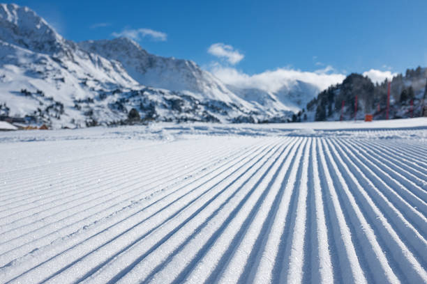 Groomed ski piste stock photo