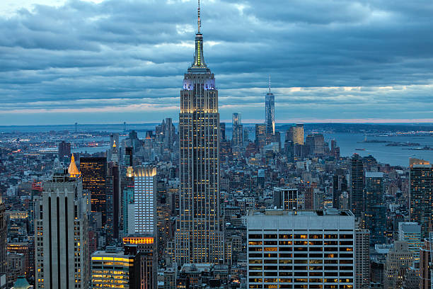 istock New York Skyscrapers Illuminated at Dusk 511585654