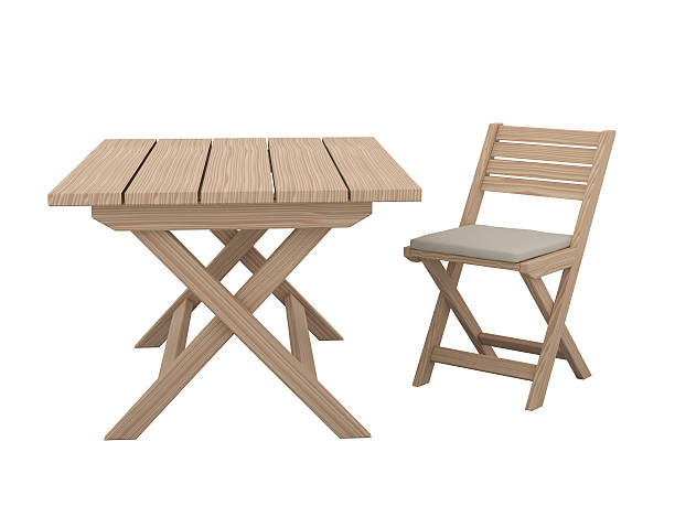 Wooden folding table and chair. stock photo