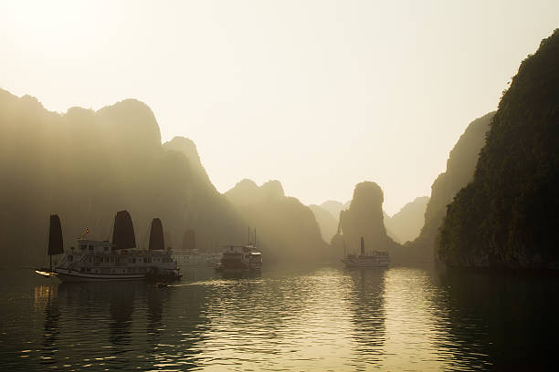 istock Dawn on Halong Bay, Vietnam with mist 511588348