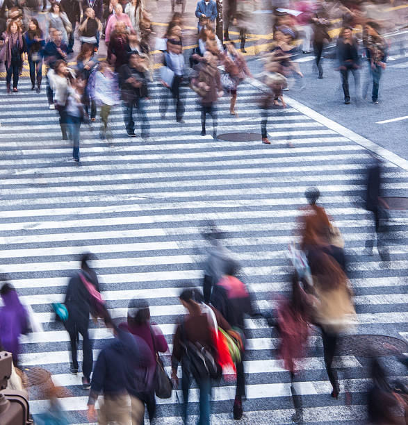 istock People crossing in shibuya 511588504