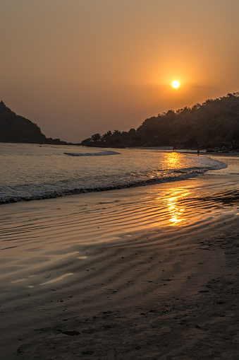 Setting sun in the exotic holiday location at Goa in India. 