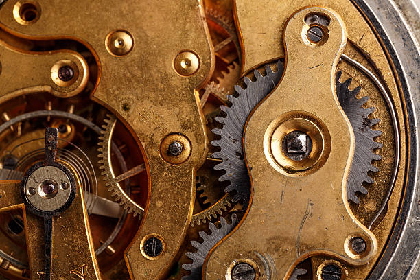 istock Closeup view of old clock's gears 511593236