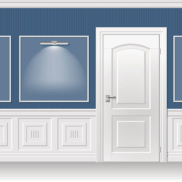 Door in the blue wall White door in the classic interior trimmed with wood paneling metal molding stock illustrations