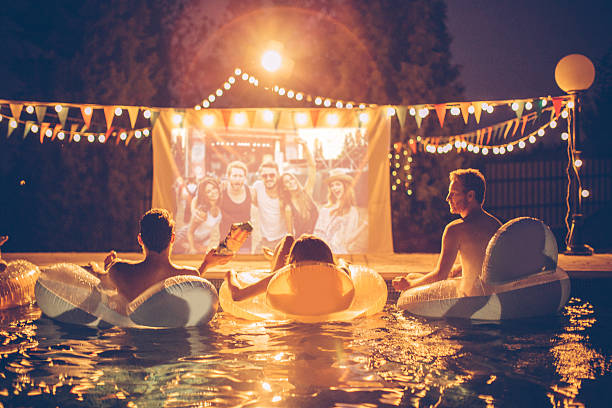 istock Pool movie night party 511598770