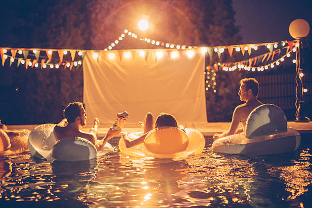 istock Pool movie night party 511599002