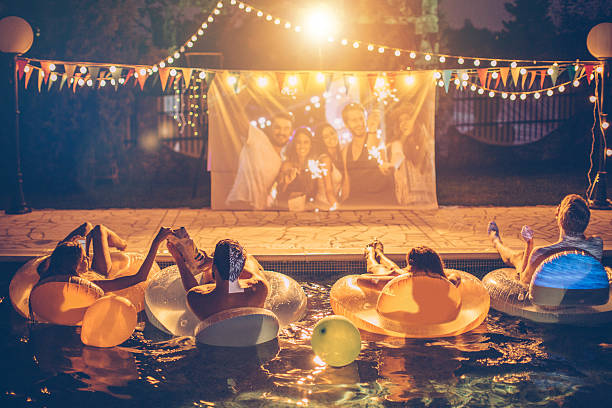 istock Pool movie night party 511599196