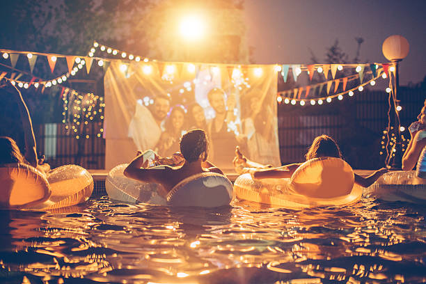 istock Pool movie night party 511599370