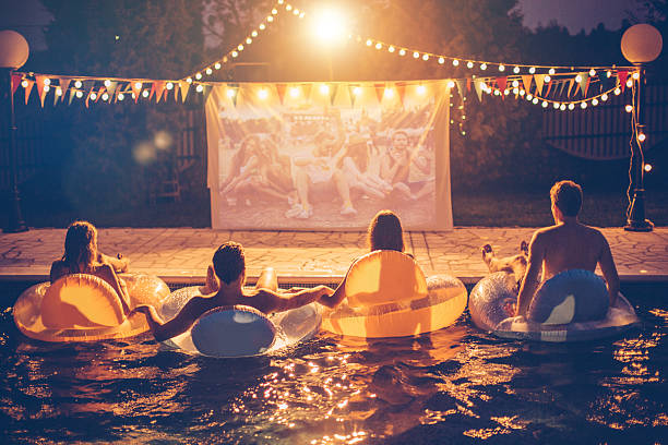 istock Pool movie night party 511599550