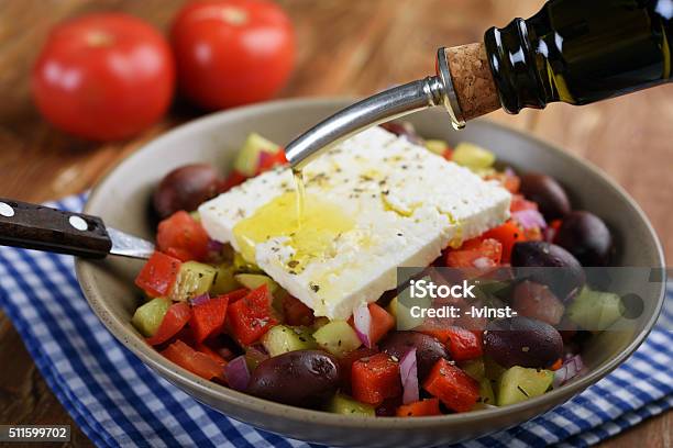 Greek Salad Stock Photo - Download Image Now - Olive Oil, Feta Cheese, Pouring