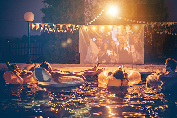 istock Pool movie night party 511599738