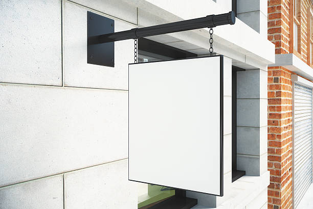 istock Blank white signboard on bulding wall on city street 511600262