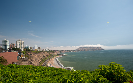 Costa Verde in Lima, Peru, with paragliders.