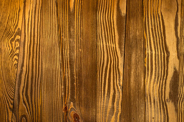 istock Variation of irregular and rough wood timber surface texture background 511604732