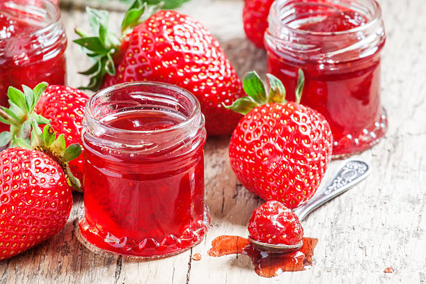 istock Strawberry confiture with whole berries and fresh strawberries 511606056
